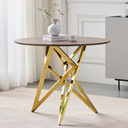 Corbridge round dining table in walnut with gold legs