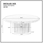 Fontaine round coffee table styled beside a sofa