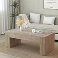 Girona rectangular coffee table in natural engineered wood, in a living room