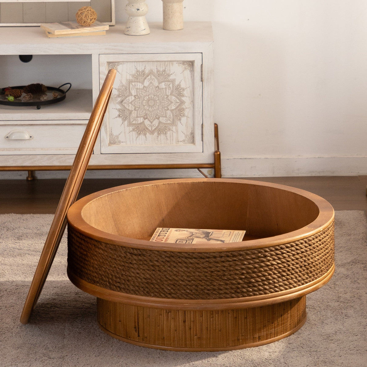 Yarrow round flip-top coffee table in natural, in a living room