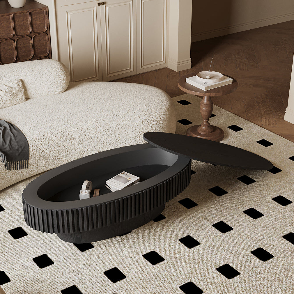 Turin oval coffee table in black, styled in a living room