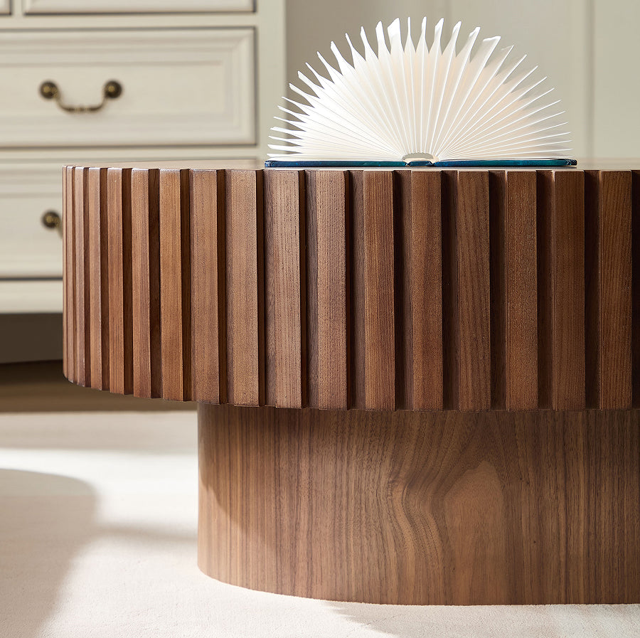 Fjord drum coffee table styled beside a sofa