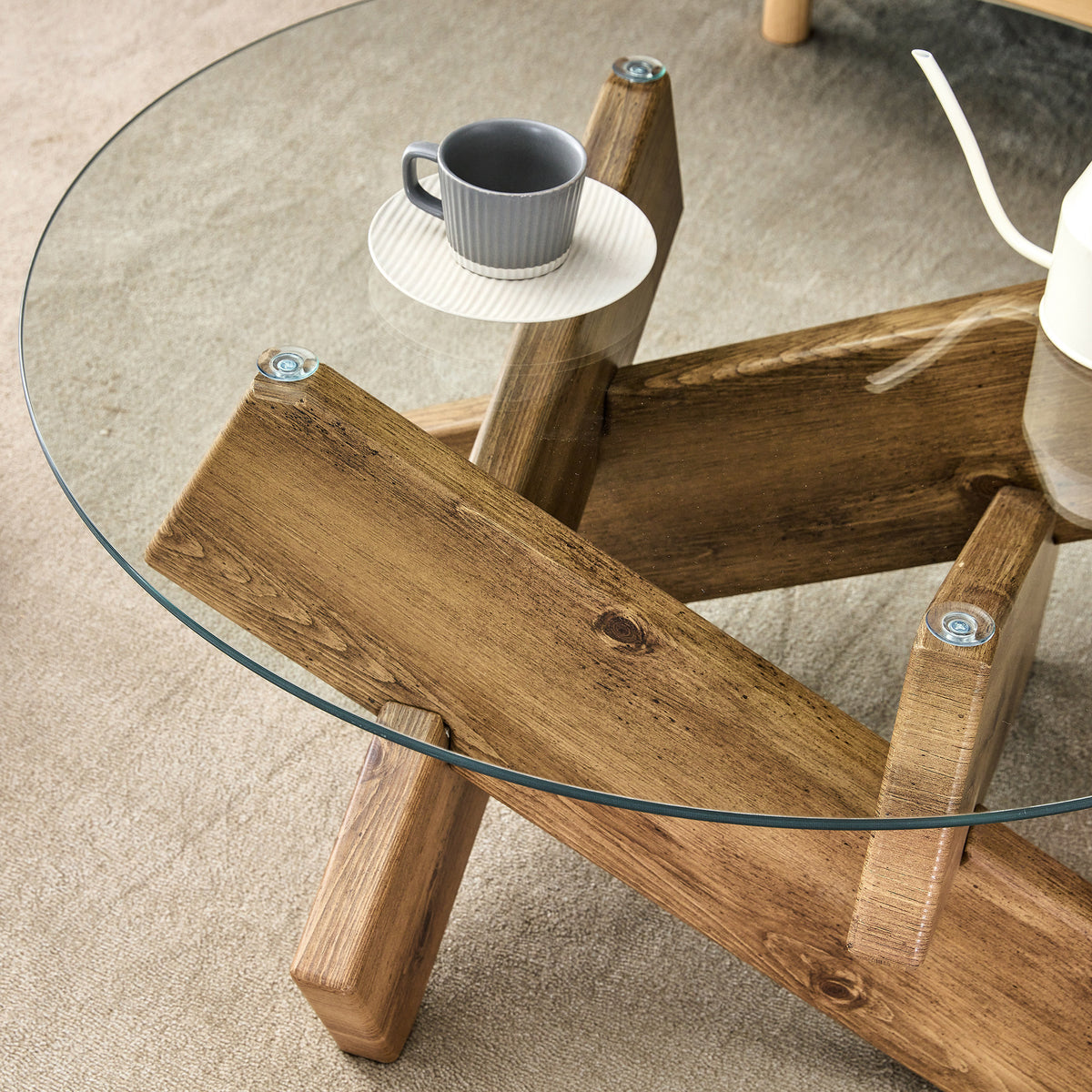 Sable glass coffee table seen from above through the glass top