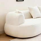 Solene Curved Sofa, wood leg detail