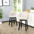 Thurso bar stool in beige fabric, nailhead trim detail