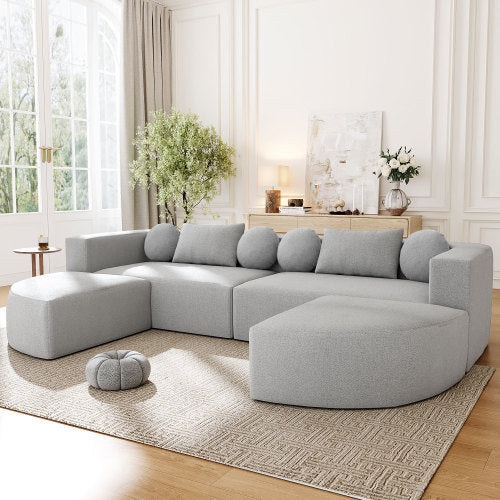 Jarrow modular sectional in dark grey chenille, in a living room