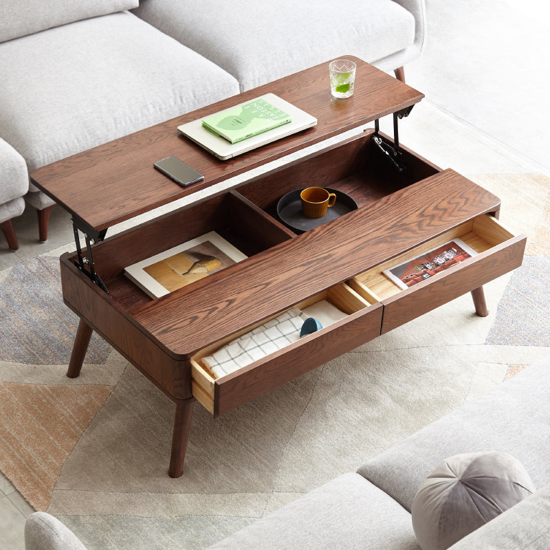 Nyborg storage coffee table in walnut, in a living room
