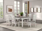 Goring farmhouse dining chairs at a table