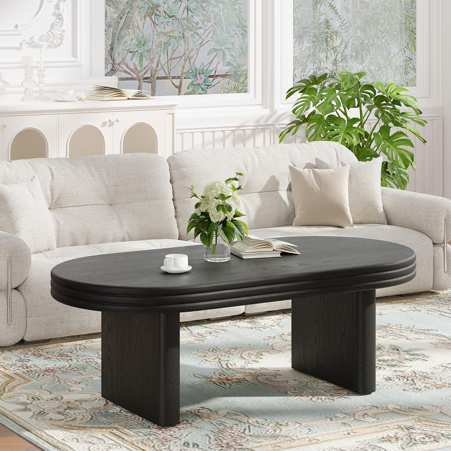 Oriel fluted coffee table in natural wood, in a living room