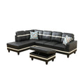Jesmond leather corner sectional in black, in a living room