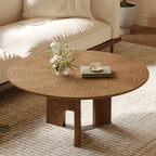 Umbra round coffee table in walnut, styled in a small living room