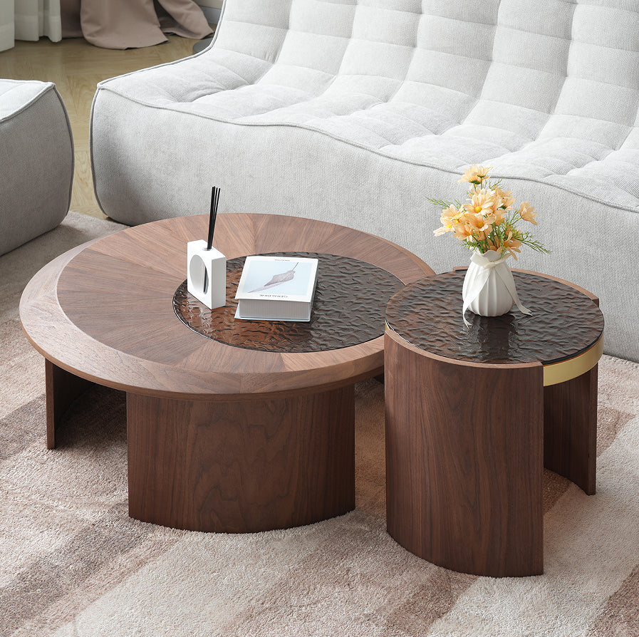 Ymir round coffee table set styled beside a sofa