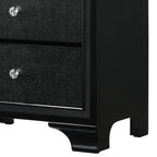 Tyneham textured nightstand styled beside a bed