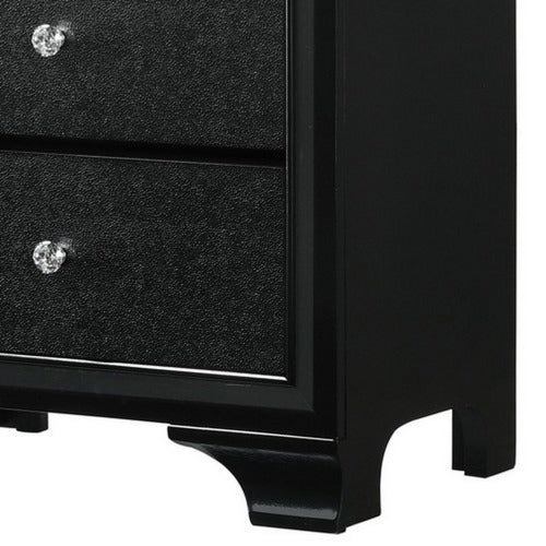 Tyneham textured nightstand styled beside a bed