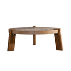 Perrin coffee table styled beside a sofa